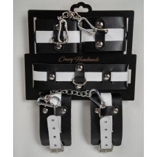 Набор фиксаторов из черной и белой натуральной кожи Набор фиксаторов из черной и белой натуральной кожи